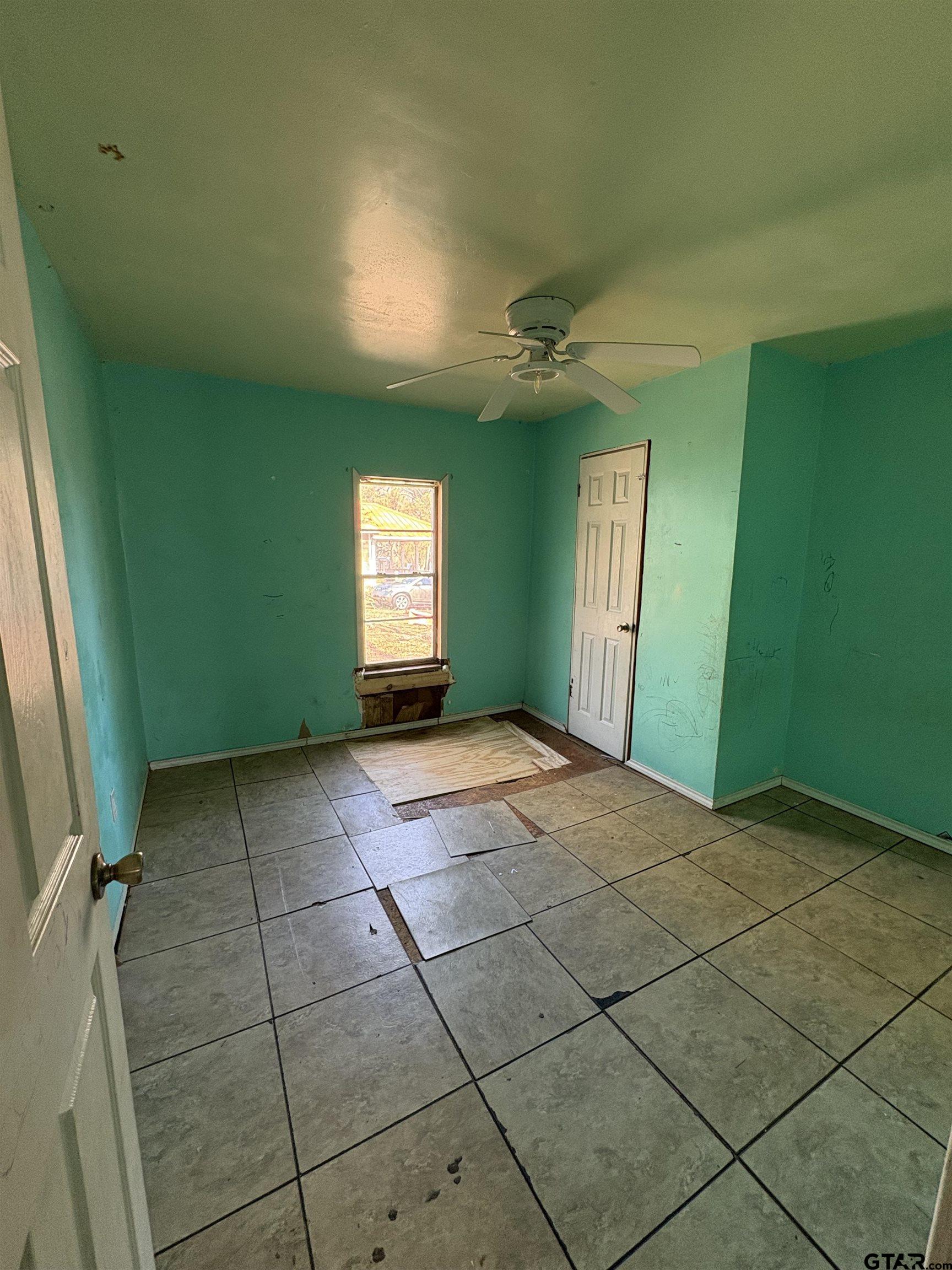 166 Alvin Rusk, TX 75785 - Photo 6 of 8 a view of empty room with windows