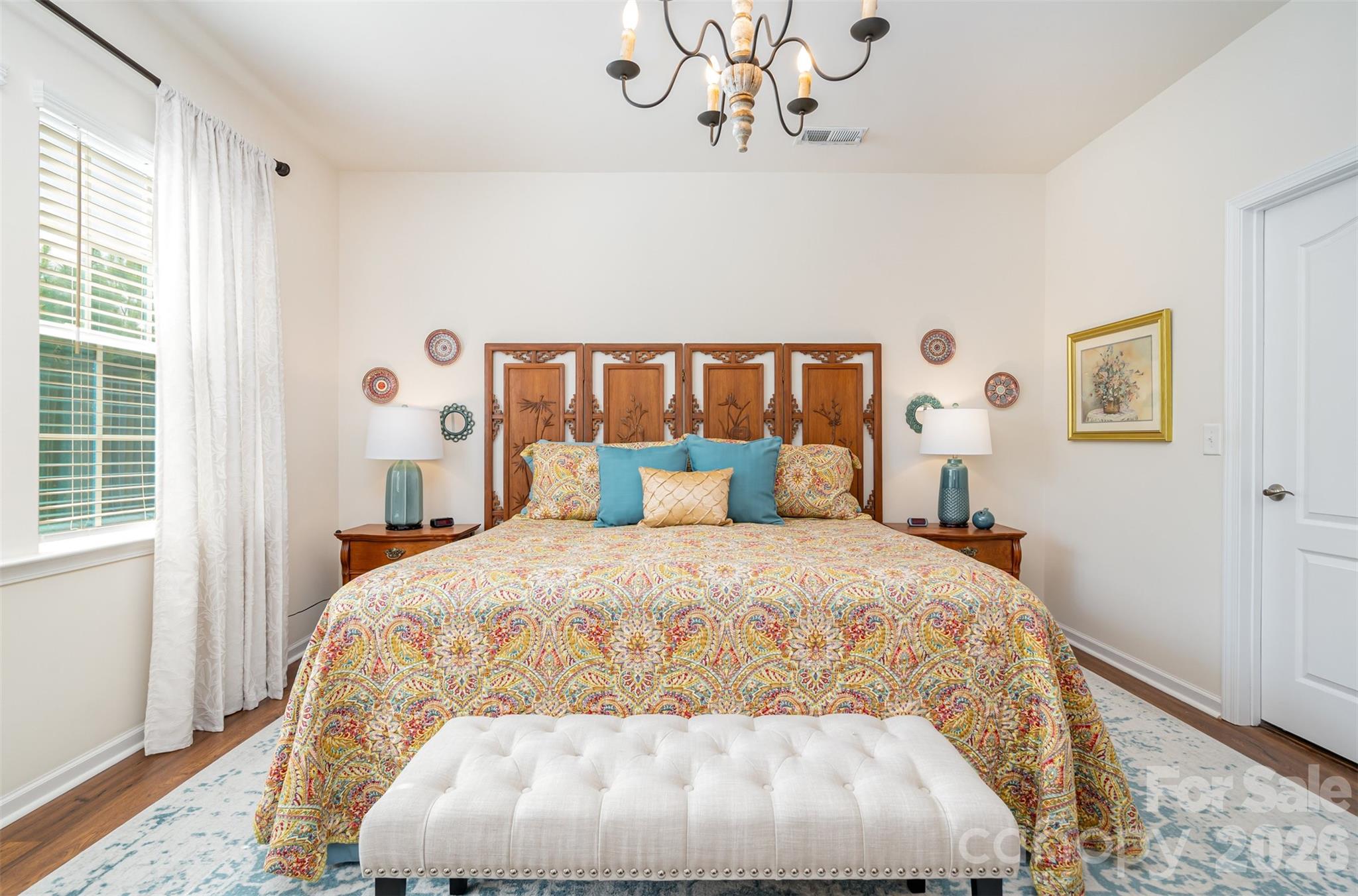 1627 Tranquility Boulevard Lancaster, SC 29720 - Photo 14 of 40 a large bed sitting in a bedroom next to a window