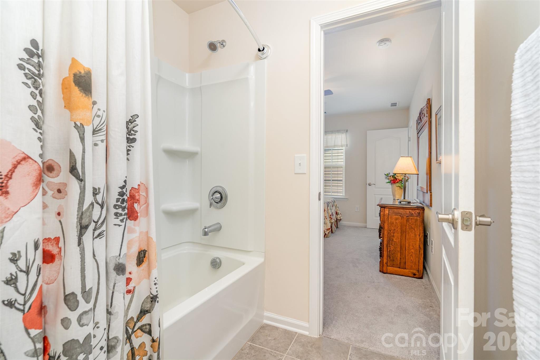 1627 Tranquility Boulevard Lancaster, SC 29720 - Photo 19 of 40 a bathroom with a bathtub and a shower