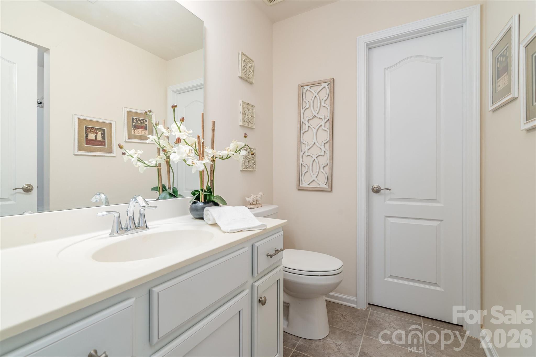 1627 Tranquility Boulevard Lancaster, SC 29720 - Photo 20 of 40 a bathroom with a sink toilet and shower