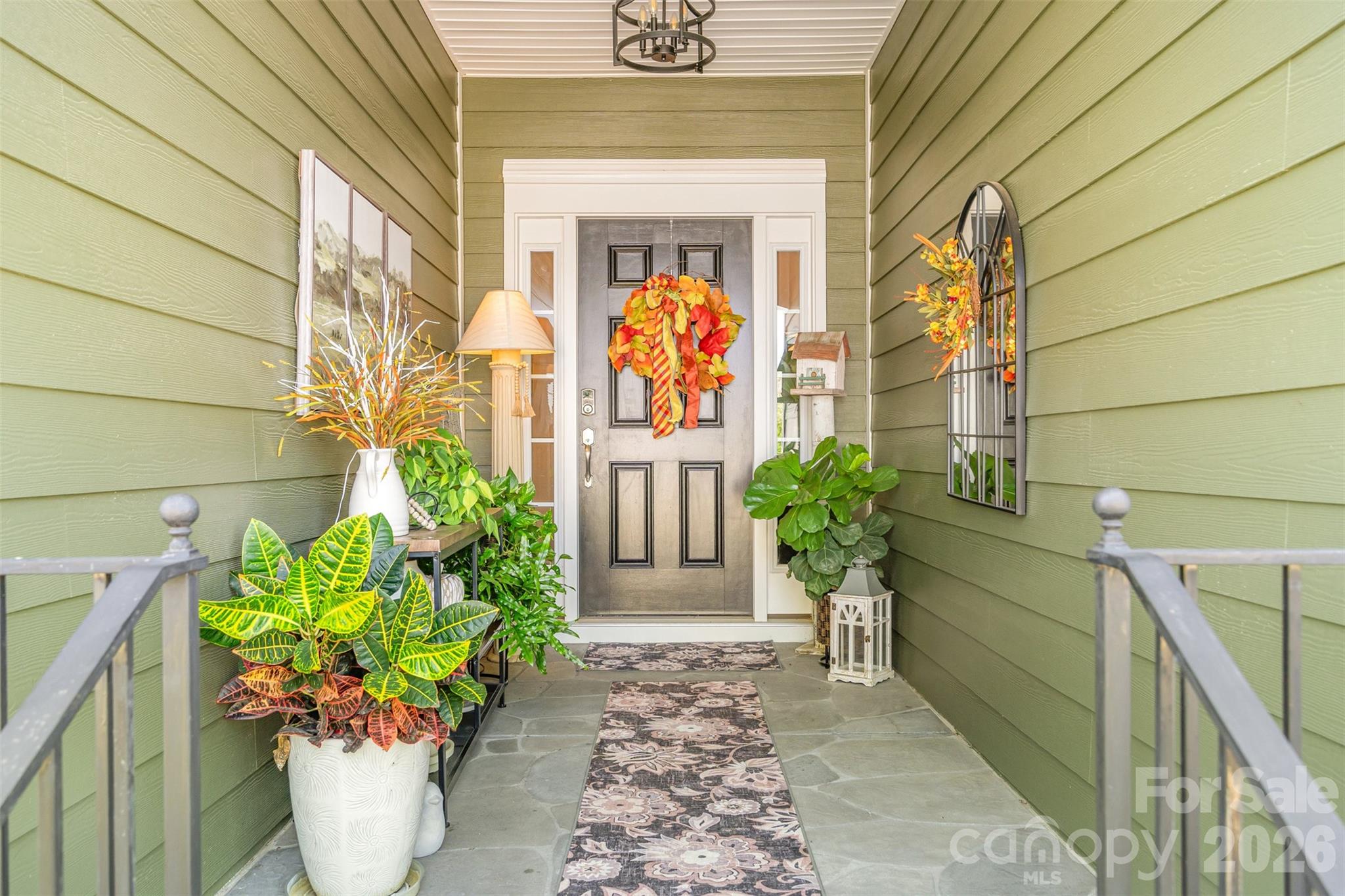 1627 Tranquility Boulevard Lancaster, SC 29720 - Photo 2 of 40 a front view of a house with outdoor seating