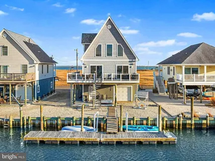 a front view of a house with swimming pool