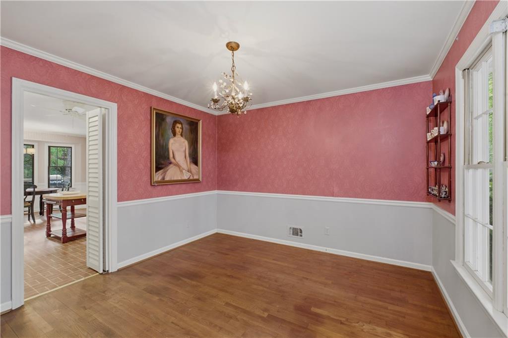 7245 Dunhill Terrace Northeast Atlanta, GA 30328 - Photo 11 of 45 a view of livingroom with hardwood floor and hallway