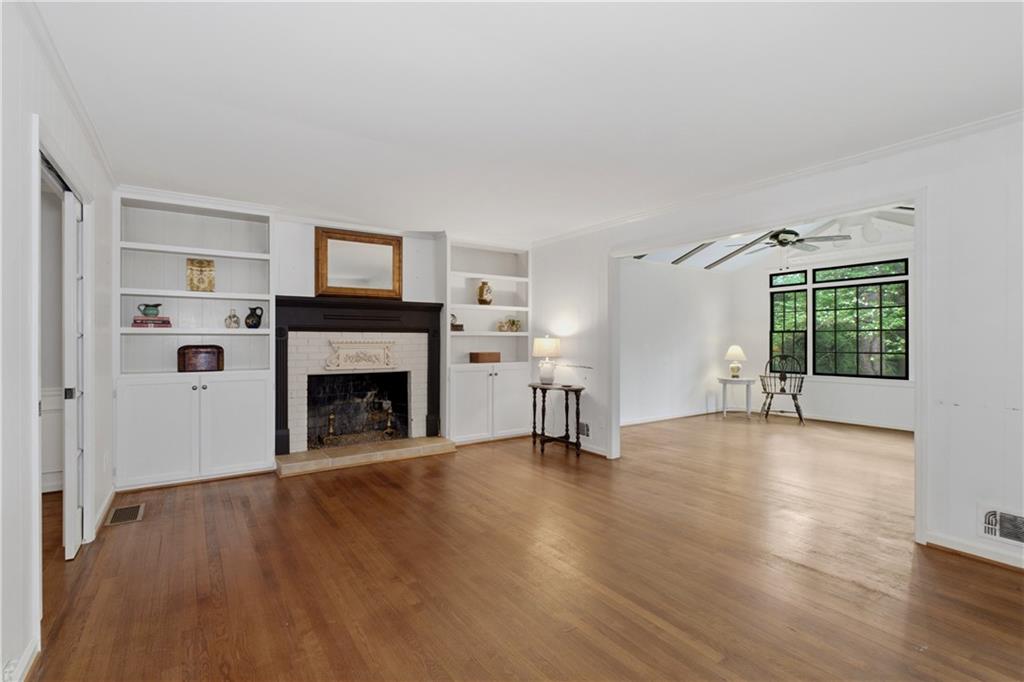7245 Dunhill Terrace Northeast Atlanta, GA 30328 - Photo 21 of 45 a view of an empty room with window and fire place