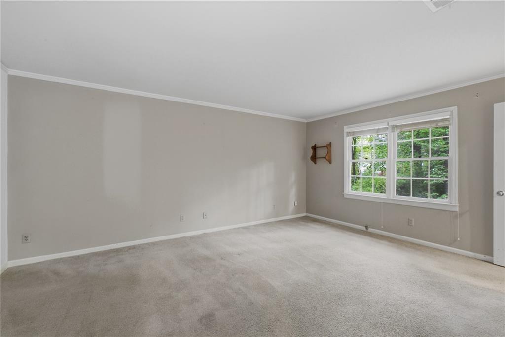 7245 Dunhill Terrace Northeast Atlanta, GA 30328 - Photo 28 of 45 an empty room with windows