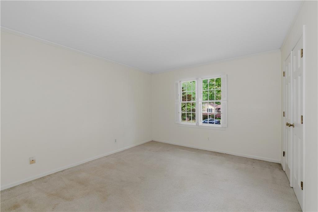 7245 Dunhill Terrace Northeast Atlanta, GA 30328 - Photo 31 of 45 an empty room with windows