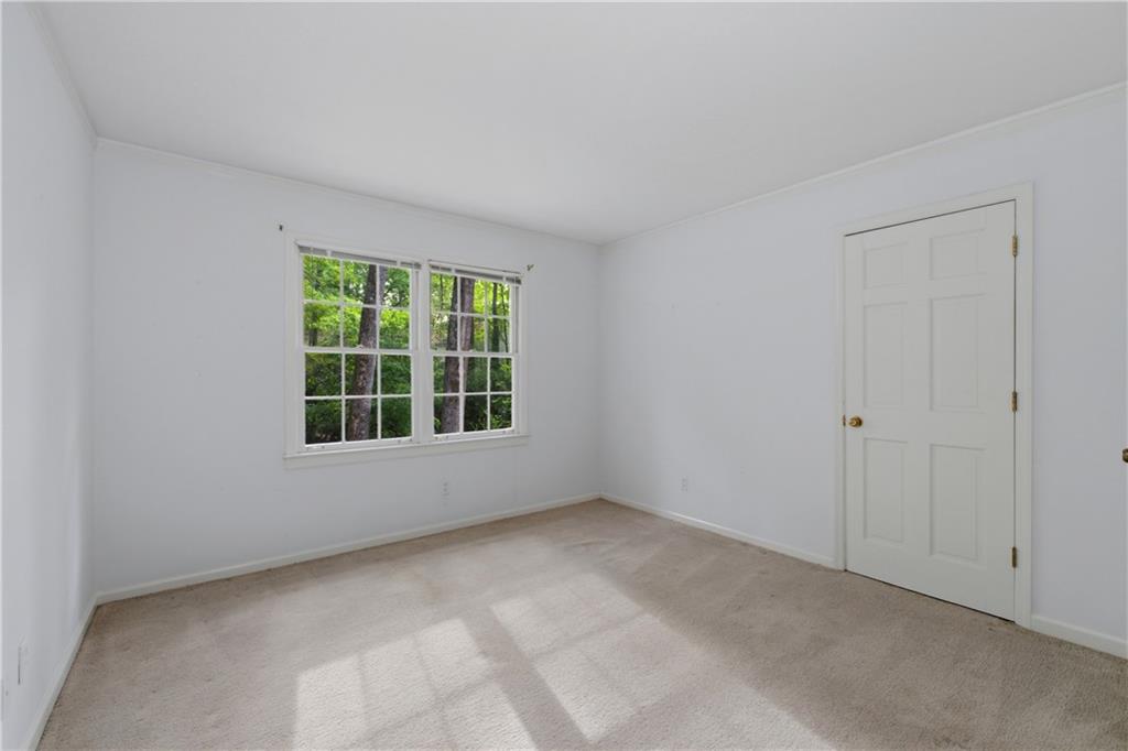 7245 Dunhill Terrace Northeast Atlanta, GA 30328 - Photo 34 of 45 an empty room with a window