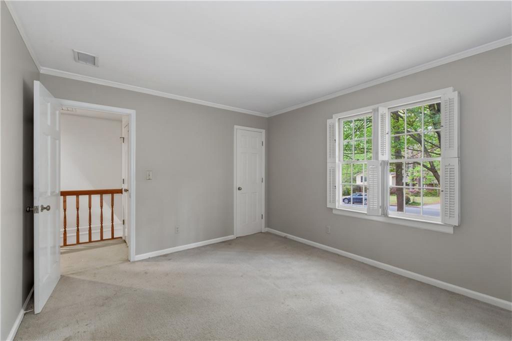 7245 Dunhill Terrace Northeast Atlanta, GA 30328 - Photo 37 of 45 an empty room with windows