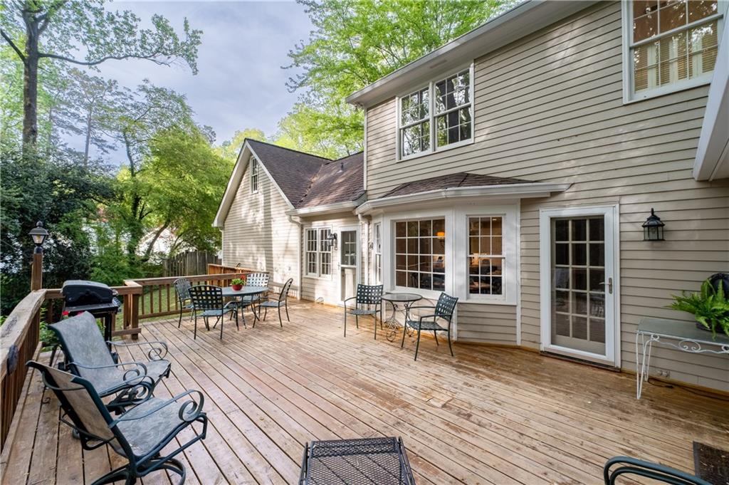 7245 Dunhill Terrace Northeast Atlanta, GA 30328 - Photo 41 of 45 a view of a house with backyard and sitting area