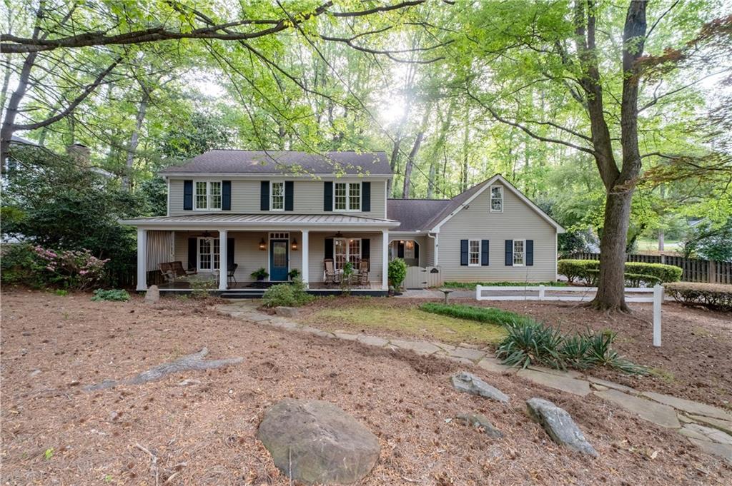 7245 Dunhill Terrace Northeast Atlanta, GA 30328 - Photo 45 of 45 a front view of a house with garden