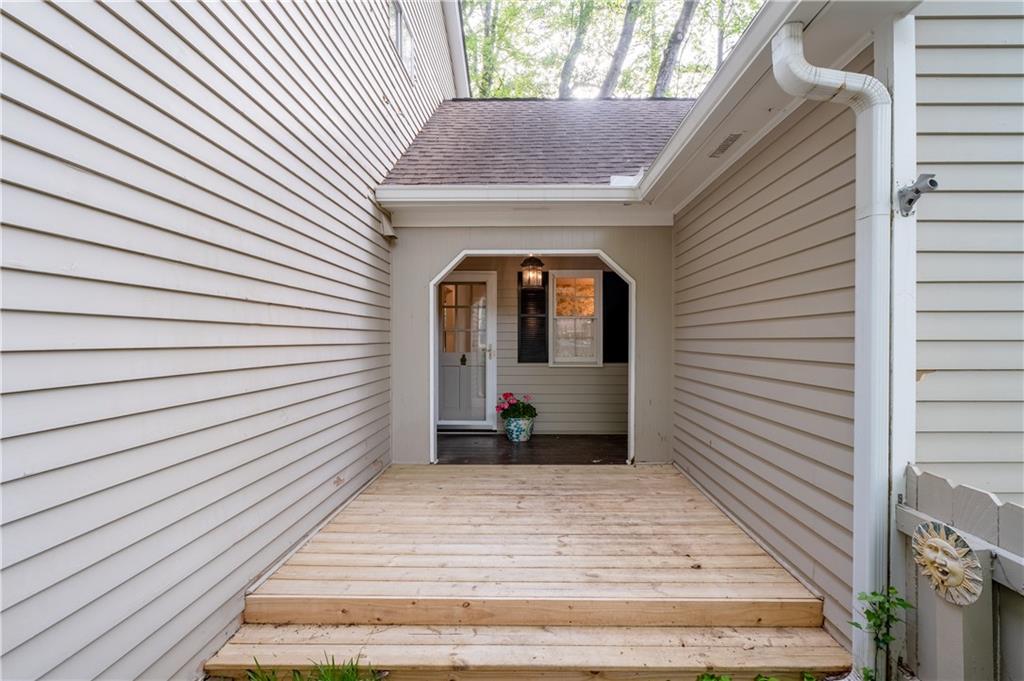 7245 Dunhill Terrace Northeast Atlanta, GA 30328 - Photo 6 of 45 a view of a house with a door