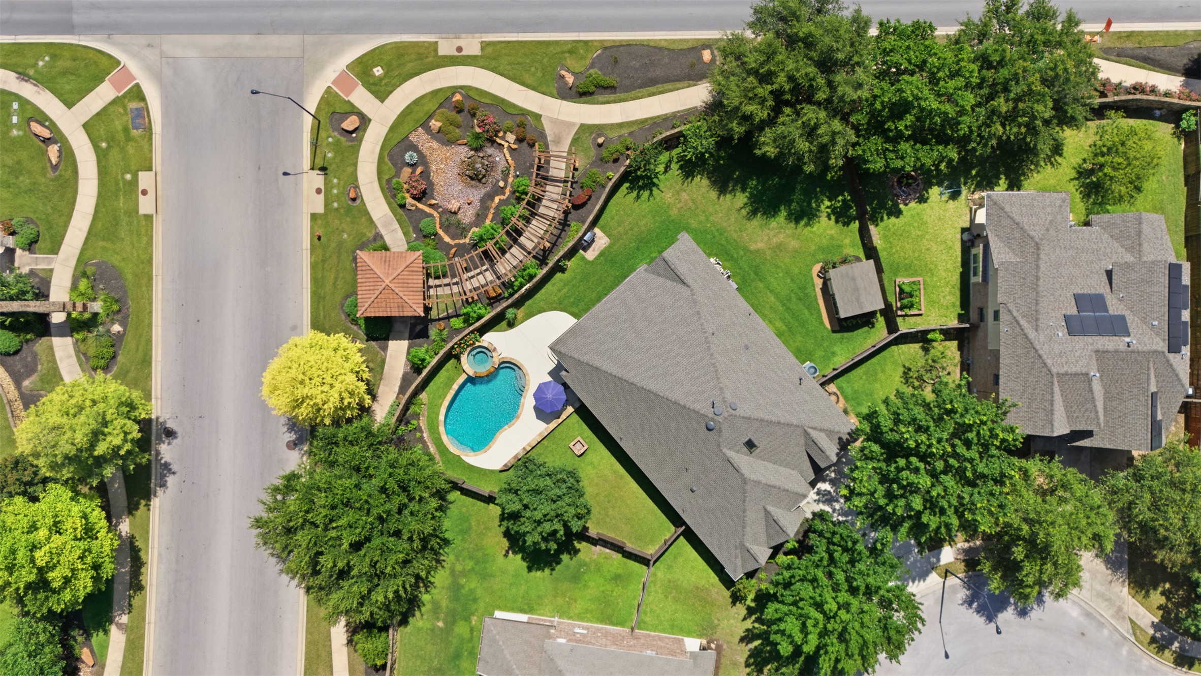 2568 Santa Barbara Loop Round Rock, TX 78665 - Photo 29 of 34 an aerial view of a swimming pool with outdoor seating and yard