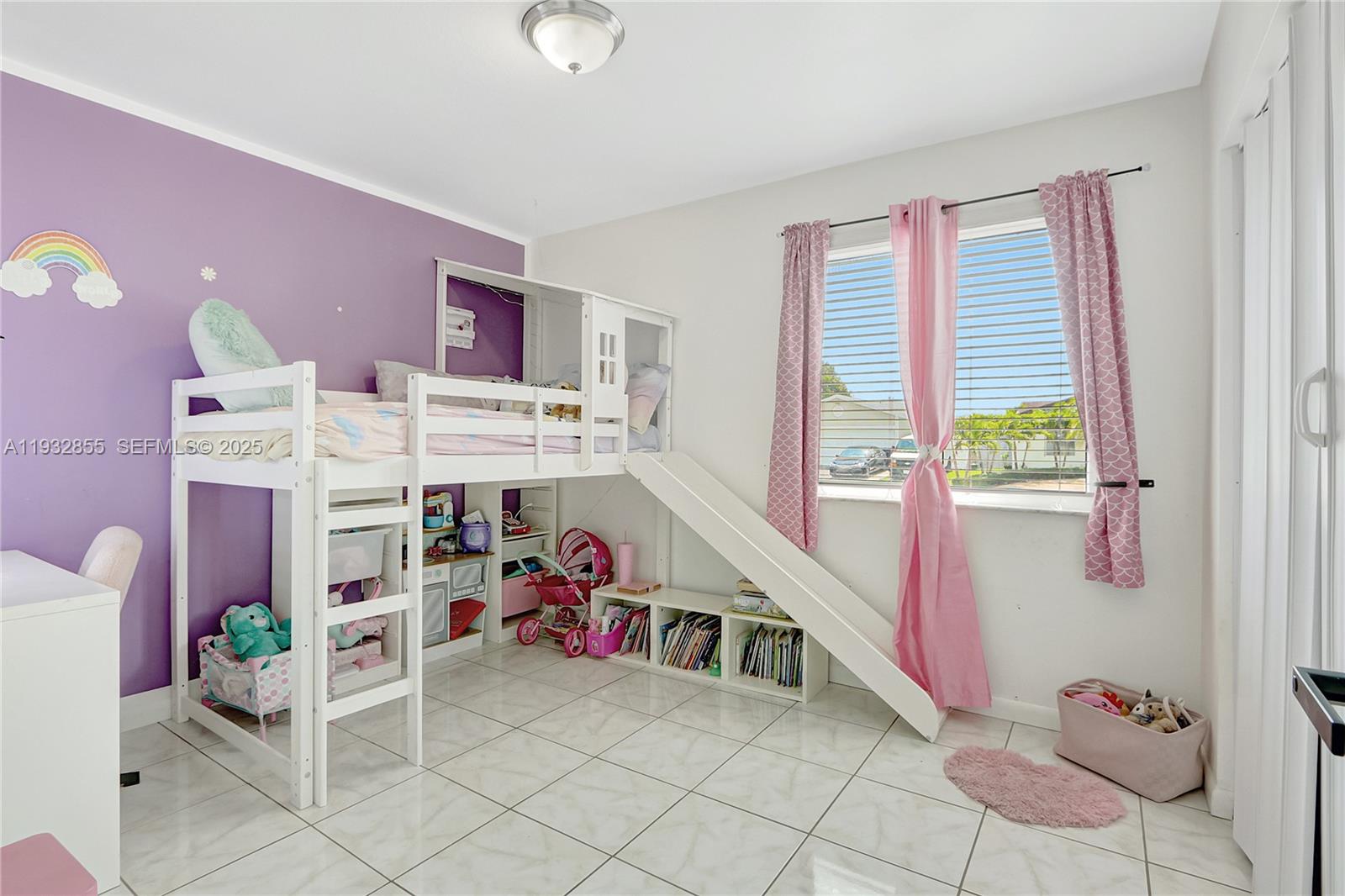 13217 Southwest 257th Terrace Homestead, FL 33032 - Photo 11 of 20 a storage room with a window