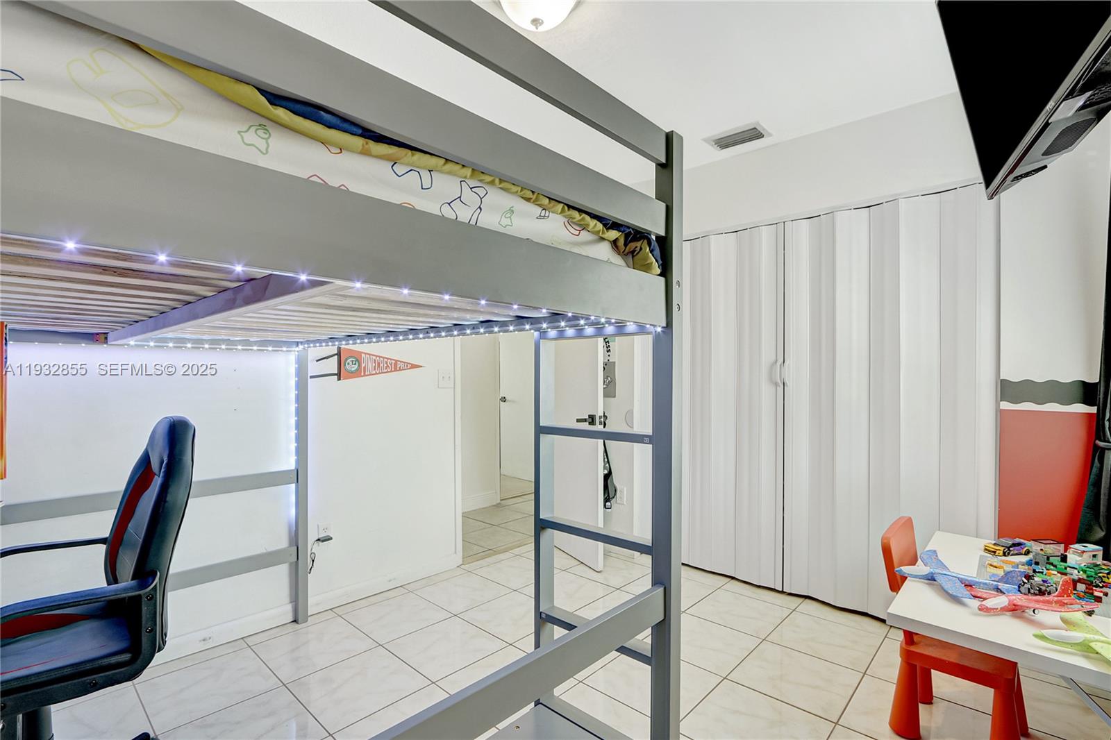 13217 Southwest 257th Terrace Homestead, FL 33032 - Photo 10 of 20 a view of room with furniture and a window