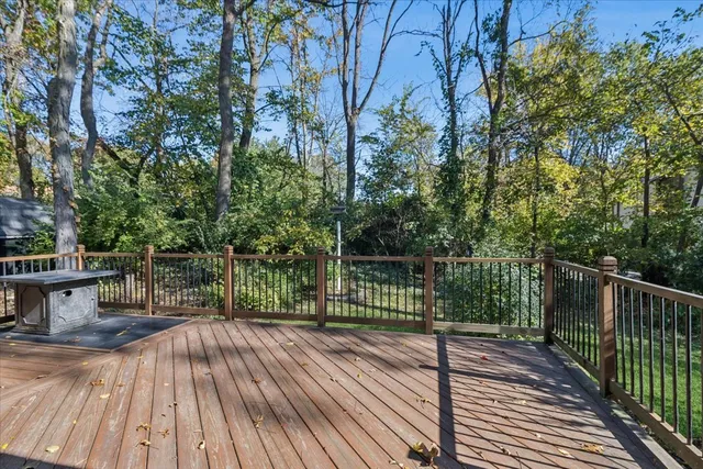 a view of balcony with wooden floor and outdoor space