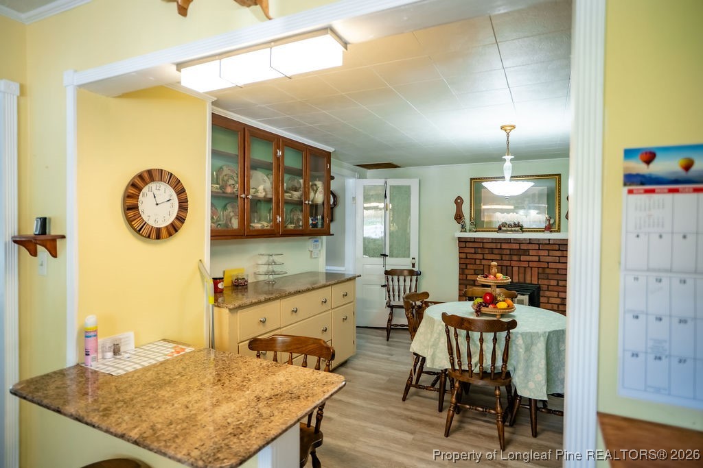 208 Thompson Street Fairmont, NC 28340 - Photo 9 of 19 a view of a dining room with furniture and window