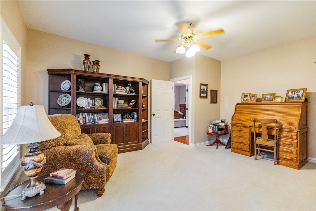 14203 Greenridge Road Fayetteville, AR 72701 - Photo 16 of 25 Spacious room featuring neutral wall paint and plush carpeting