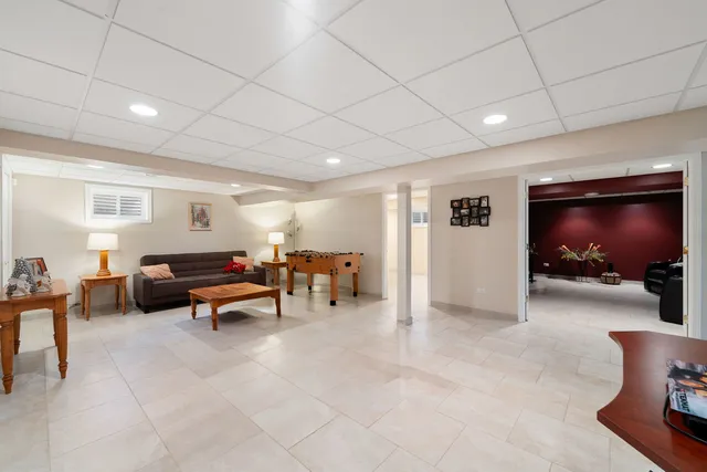 a view of a livingroom with furniture and a flat screen tv