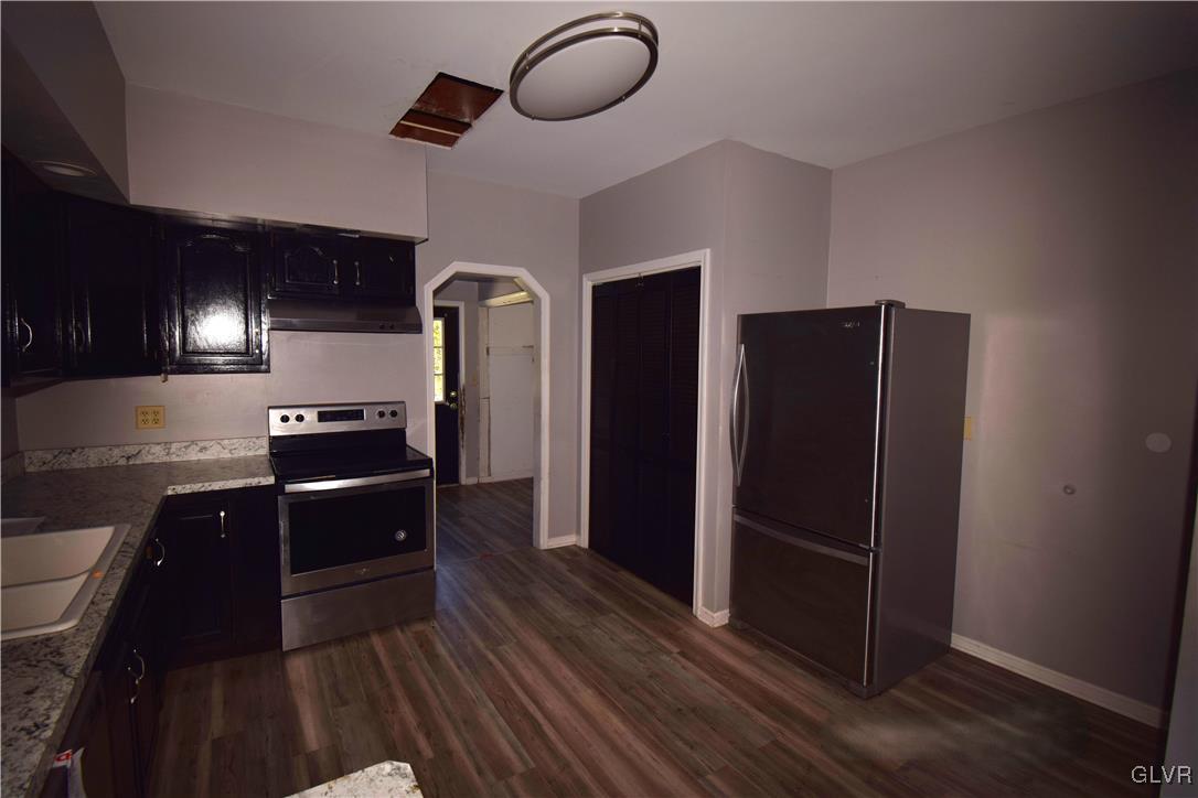 60 Mill Road Palmerton, PA 18071 - Photo 11 of 23 a kitchen with stainless steel appliances granite countertop a refrigerator and a stove top oven