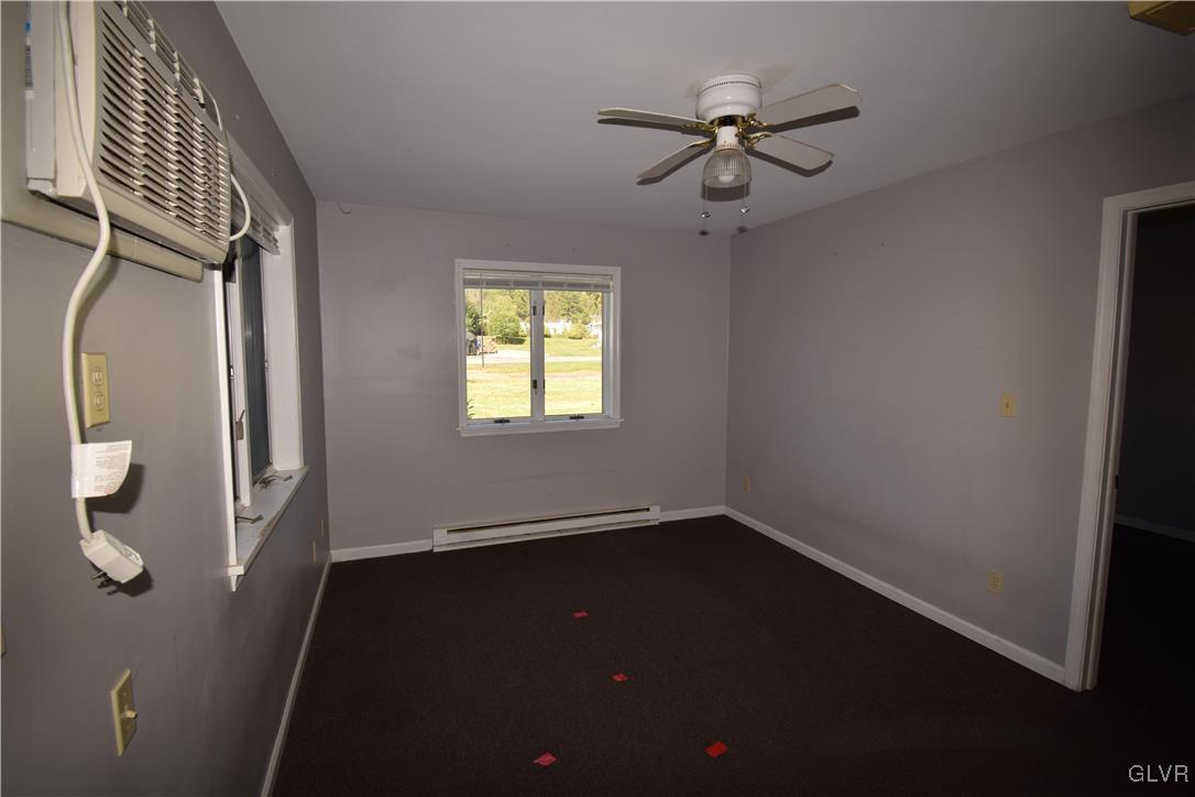 60 Mill Road Palmerton, PA 18071 - Photo 13 of 23 an empty room with windows and fan