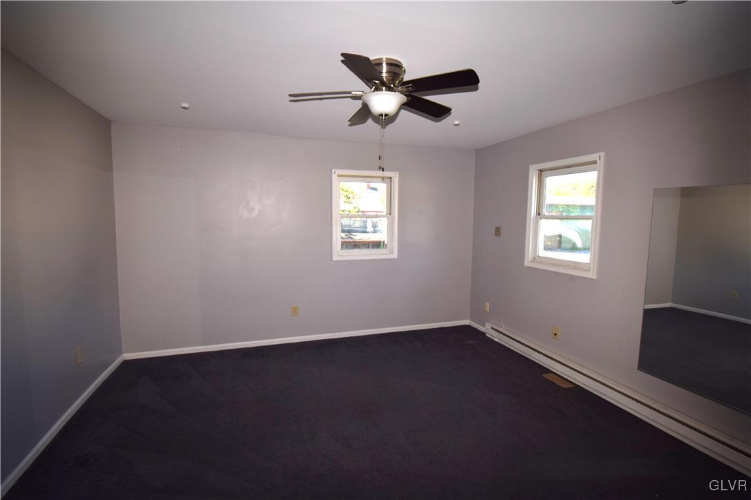 60 Mill Road Palmerton, PA 18071 - Photo 16 of 23 a view of an empty room with wooden floor and a window