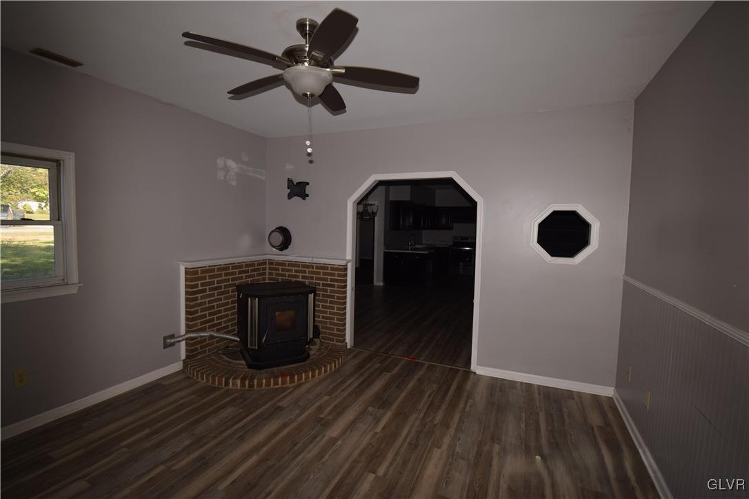 60 Mill Road Palmerton, PA 18071 - Photo 7 of 23 wooden floor in an empty room with a fireplace