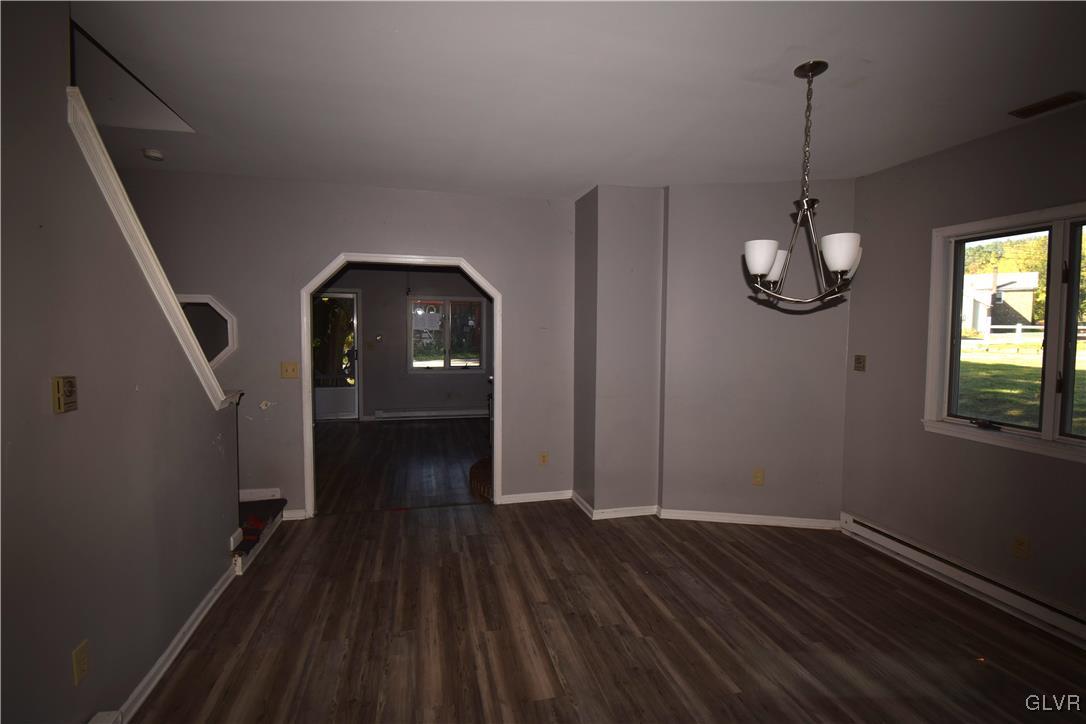 60 Mill Road Palmerton, PA 18071 - Photo 9 of 23 a view of a hallway with wooden floor and staircase