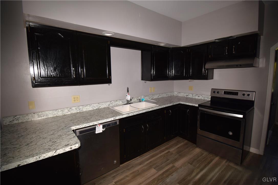 60 Mill Road Palmerton, PA 18071 - Photo 10 of 23 a kitchen with stainless steel appliances granite countertop a sink and a stove