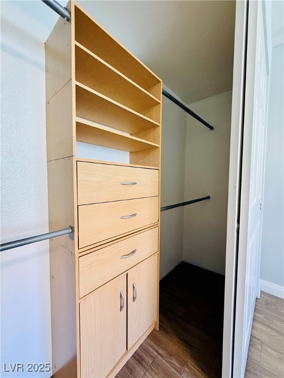 2750 South Durango Drive, Unit 2010 Las Vegas, NV 89117 - Photo 17 of 31 Spacious closet with light wood-style flooring