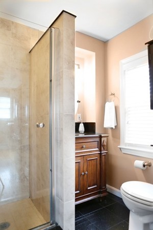 1 Taylor Road Billerica, MA 01821 - Photo 6 of 12 a bathroom with a sink a toilet and shower