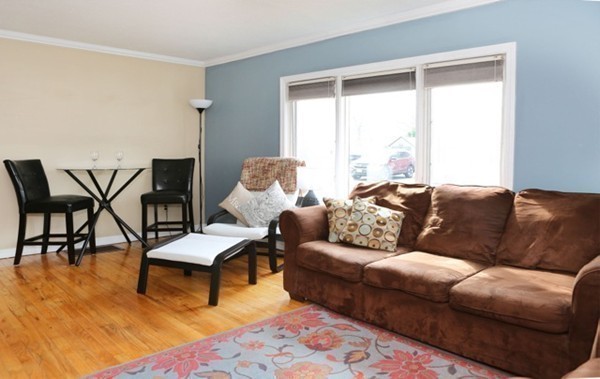 1 Taylor Road Billerica, MA 01821 - Photo 8 of 12 a living room with furniture and a large window