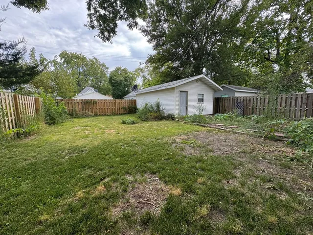 a house view with a garden space