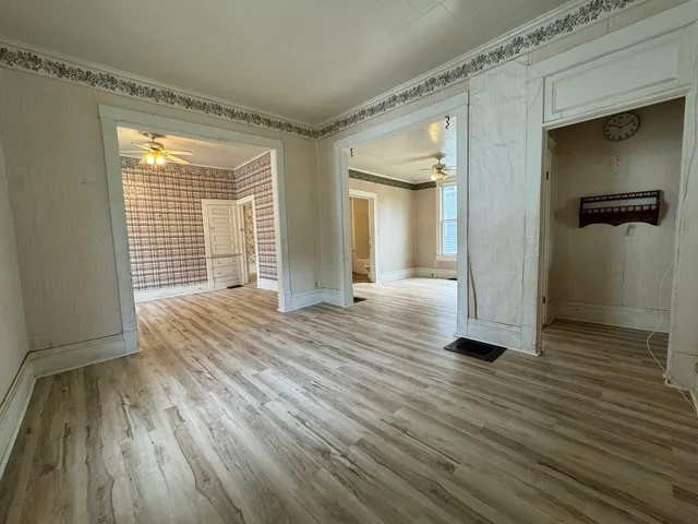a view of a livingroom with wooden floor