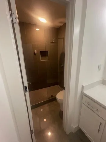 a bathroom with a sink and a toilet