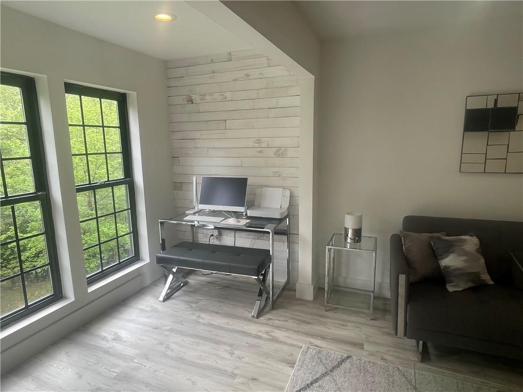 24208 Plantation Drive Northeast, Unit 208 Atlanta, GA 30324 - Photo 9 of 12 a workspace with furniture and a window