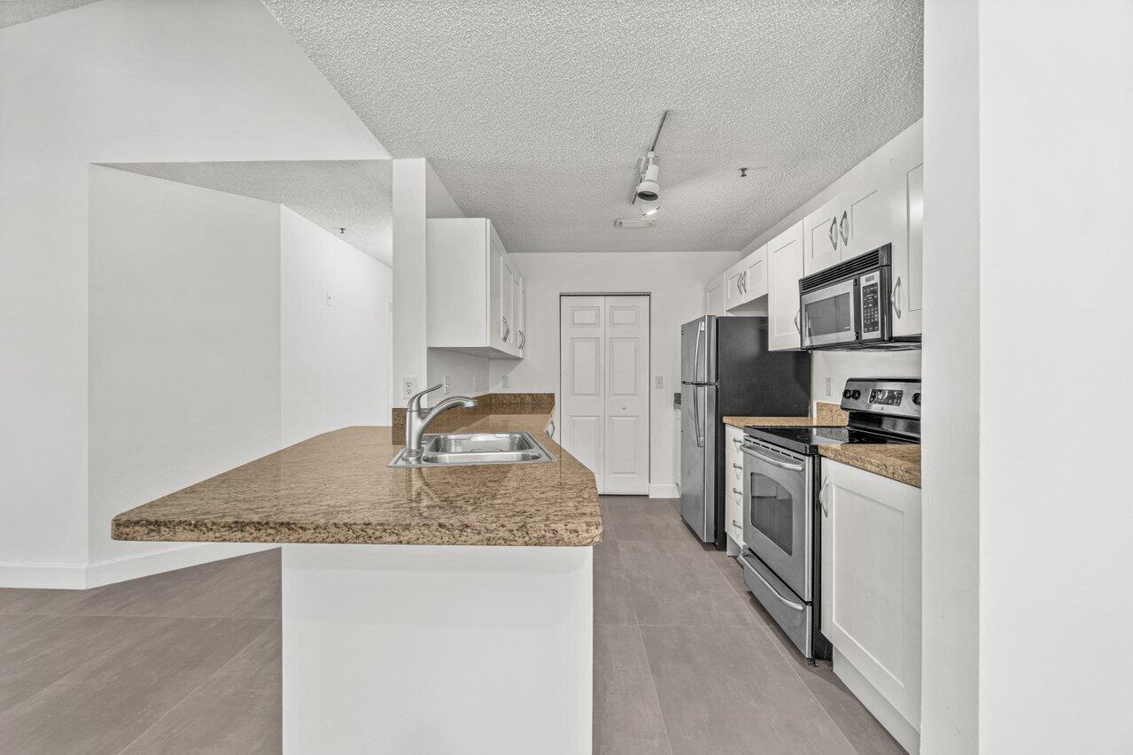 3131 Clint Moore Road, Unit 202 Boca Raton, FL 33496 - Photo 3 of 36 003-3131ClintMooreRoad-BocaRaton-FL-3349