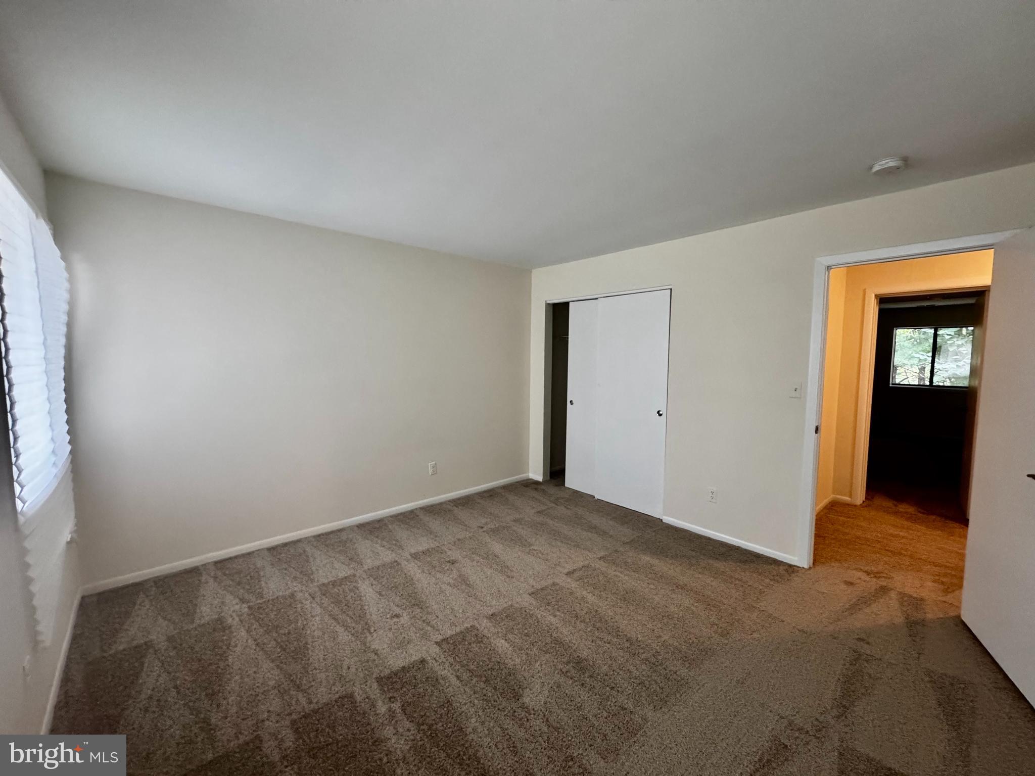 8 Winners Circle, Unit 2B Owings Mills, MD 21117 - Photo 8 of 14 a view of an empty room and window