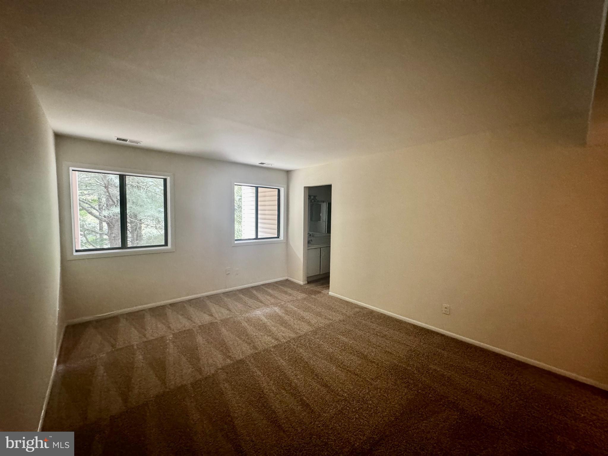 8 Winners Circle, Unit 2B Owings Mills, MD 21117 - Photo 9 of 14 a view of an empty room with a window