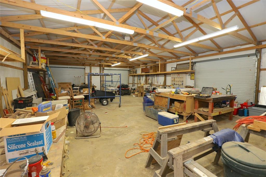209 Addison Road Mansfield, LA 71052 - Photo 25 of 25 Garage with a workshop area