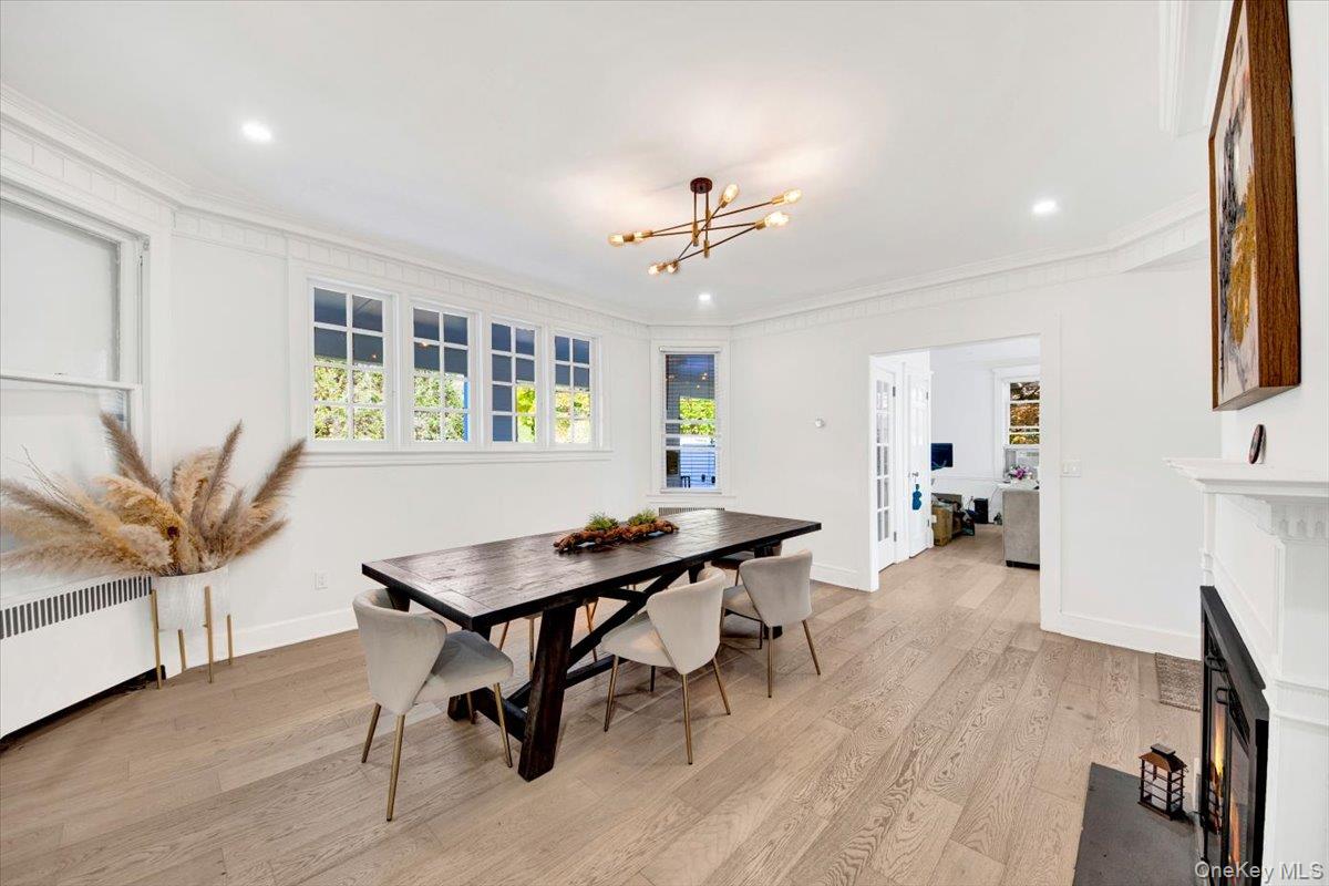 1 Slocum Street New Rochelle, NY 10801 - Photo 12 of 49 a view of a workspace with furniture and a wooden floor