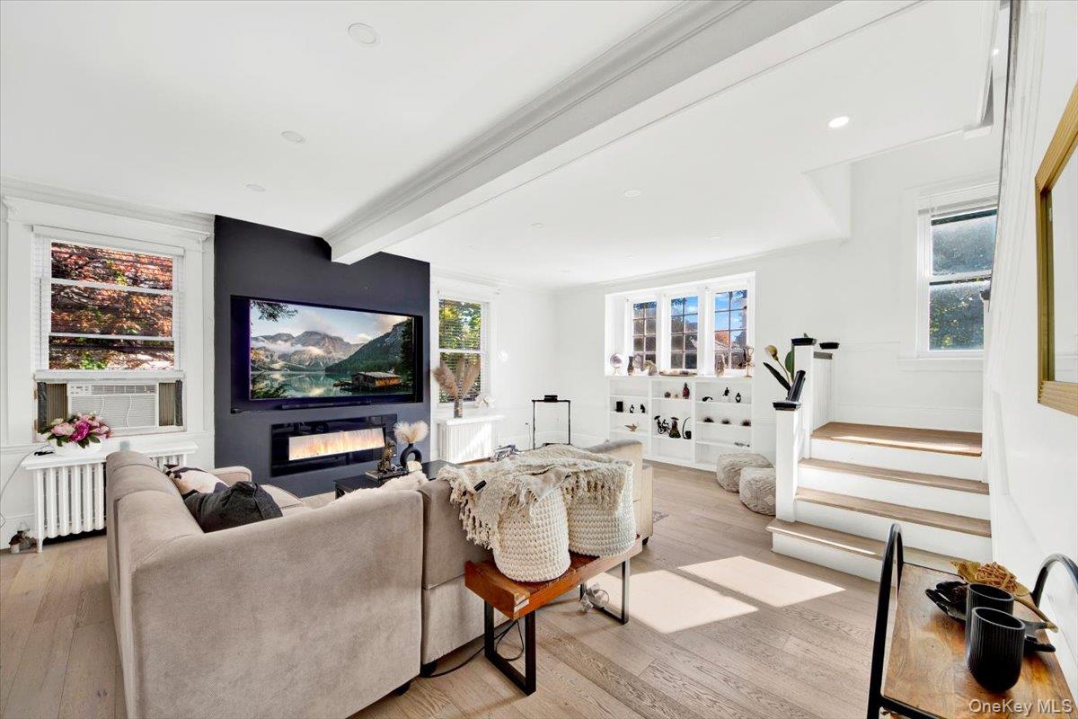 1 Slocum Street New Rochelle, NY 10801 - Photo 15 of 49 a living room with furniture and a flat screen tv