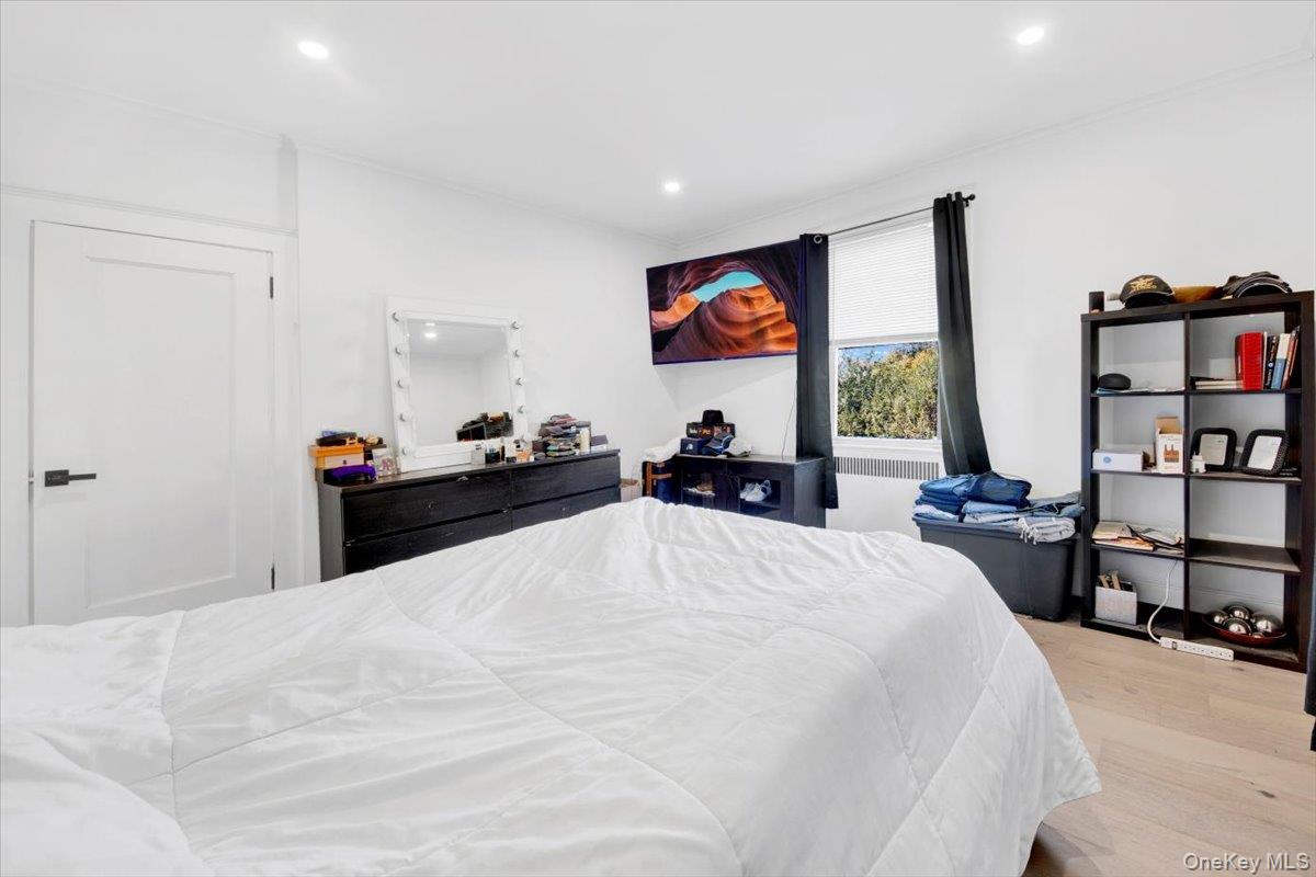 1 Slocum Street New Rochelle, NY 10801 - Photo 25 of 49 a bed room with a bed and a television