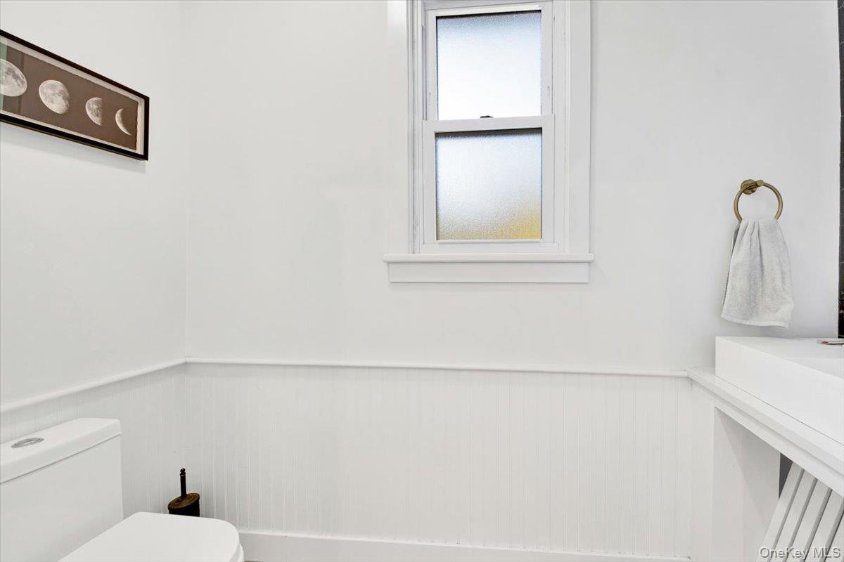 1 Slocum Street New Rochelle, NY 10801 - Photo 31 of 49 a bathroom with a bathtub and a sink