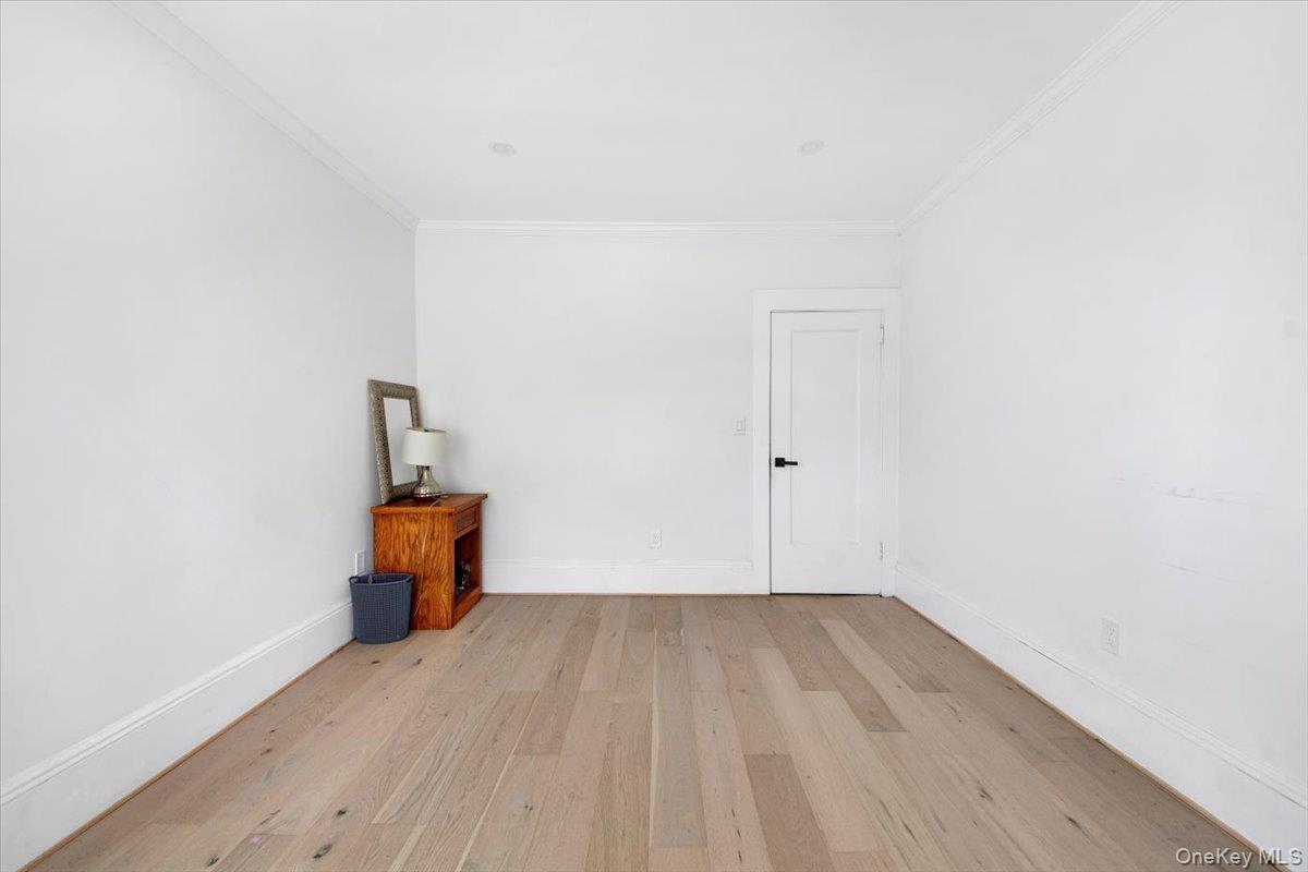 1 Slocum Street New Rochelle, NY 10801 - Photo 35 of 49 a view of room with wooden floor