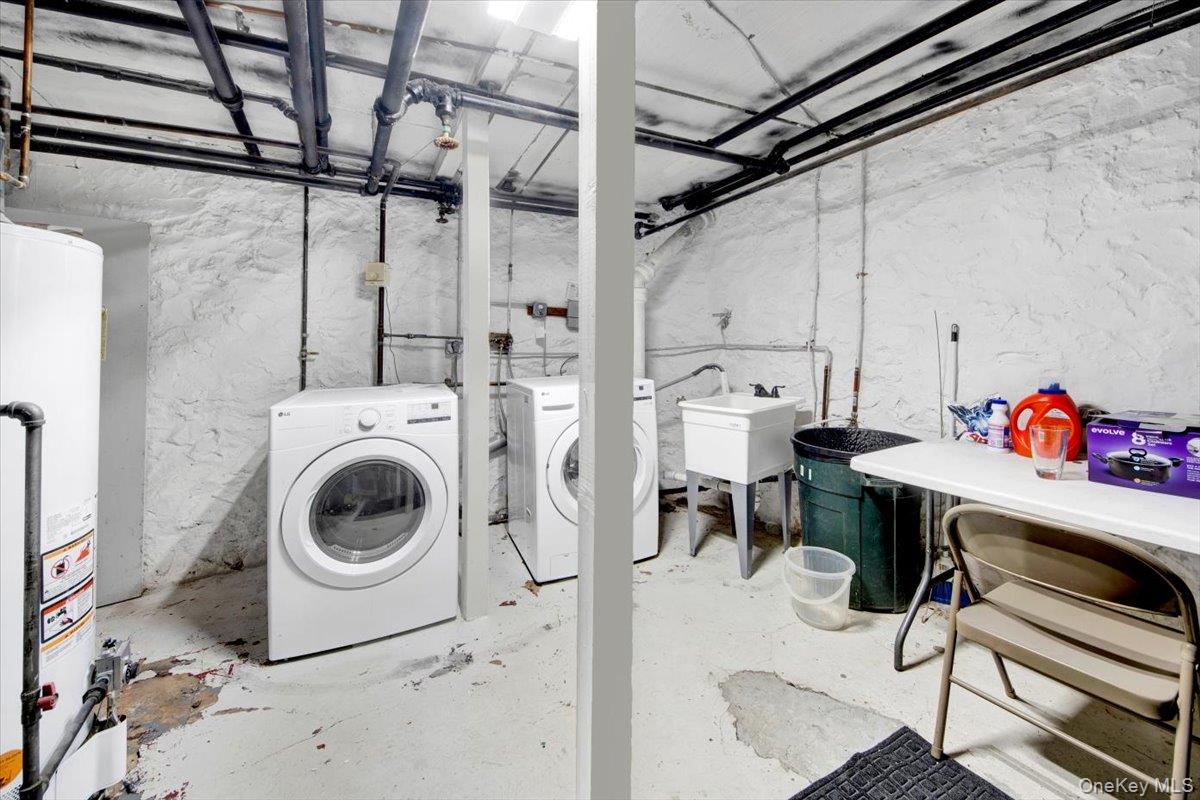 1 Slocum Street New Rochelle, NY 10801 - Photo 40 of 49 a utility room with dryer and washer