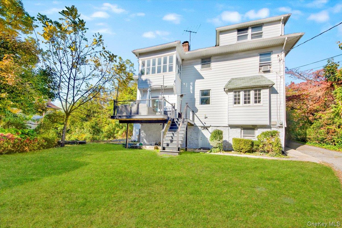 1 Slocum Street New Rochelle, NY 10801 - Photo 43 of 49 a view of a house with a yard
