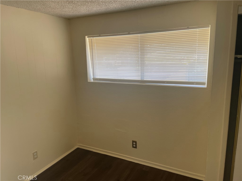 8343 Trey Avenue, Unit A Riverside, CA 92503 - Photo 16 of 17 an empty room with a window