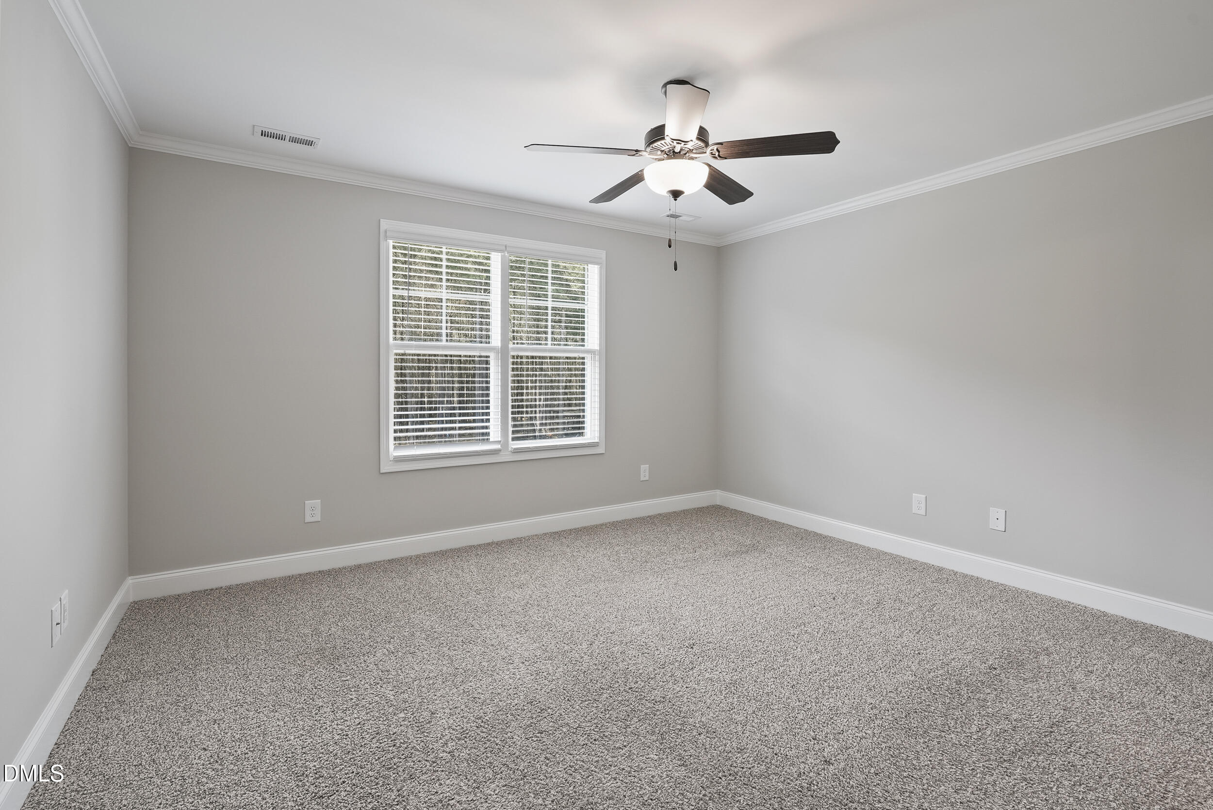 262 Day Lily Street Selma, NC 27576 - Photo 23 of 39 a view of an empty room with a window