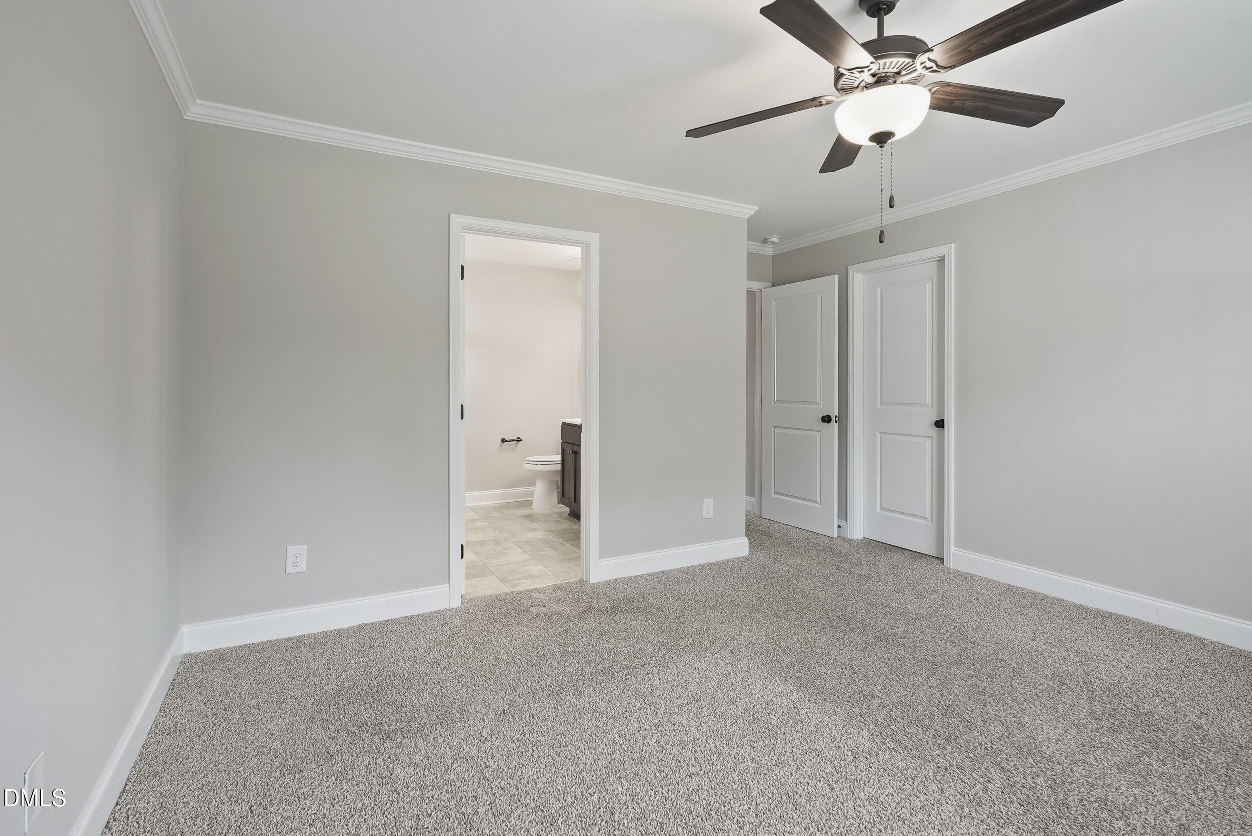 262 Day Lily Street Selma, NC 27576 - Photo 26 of 39 en empty room with fan and a ceiling fan
