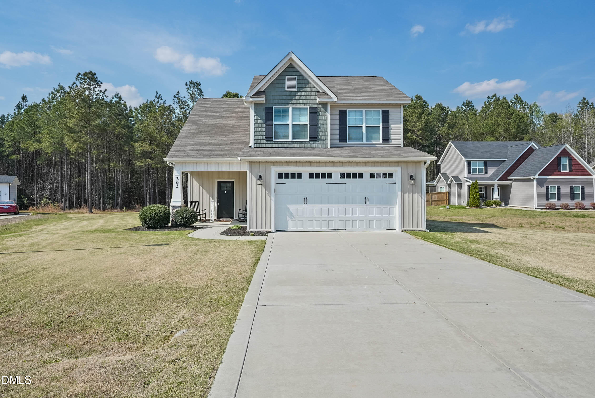 262 Day Lily Street Selma, NC 27576 - Photo 29 of 39 a front view of a house with a yard